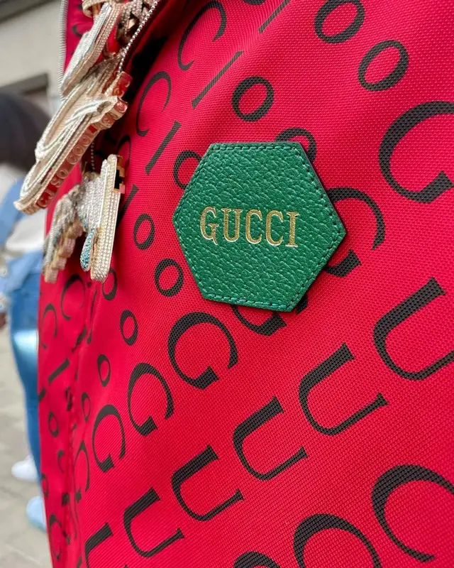 CJ So Cool outfit in Gucci, Amiri, and Louis Vuitton, 2021