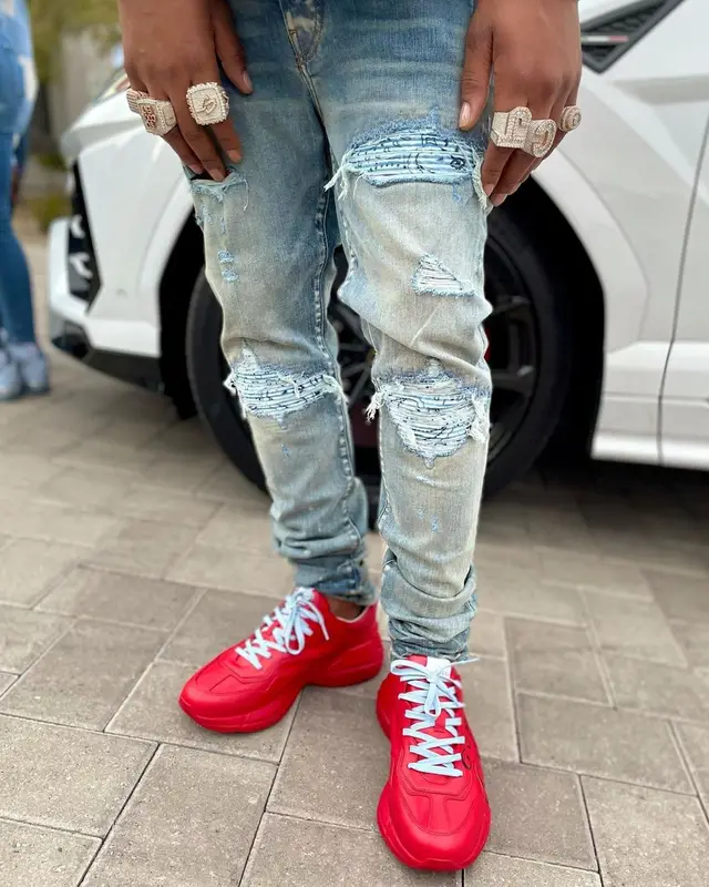 CJ So Cool outfit in Gucci, Amiri, and Louis Vuitton, 2021