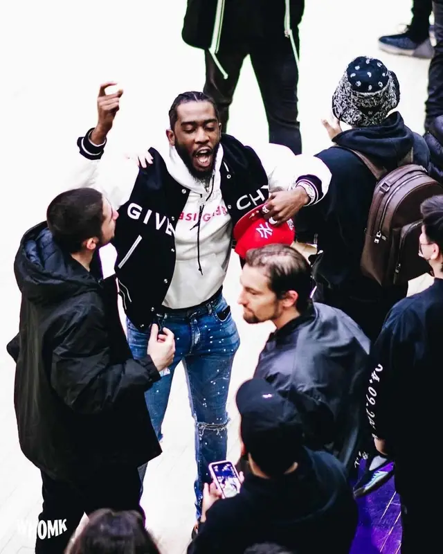 Desiigner outfit in Givenchy, Prada, and New Era, 2021