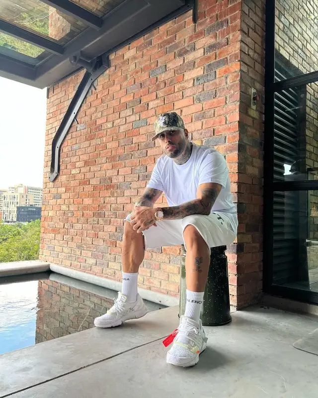 Nicky Jam outfit in Hanes, Gallery Dept., and Balenciaga, 2021