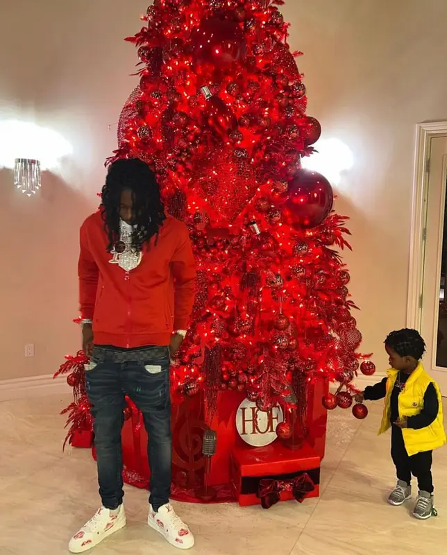 Polo G outfit in Louis Vuitton and Amiri, 2021