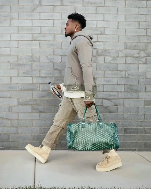 Marquise Goodwin outfit in Greg Lauren, Loewe, and Goyard, 2021