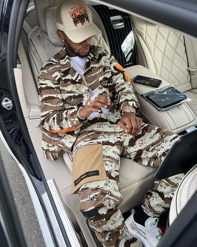 Toosii outfit in Bape, Nike, and Rolling Loud Merch, 2021
