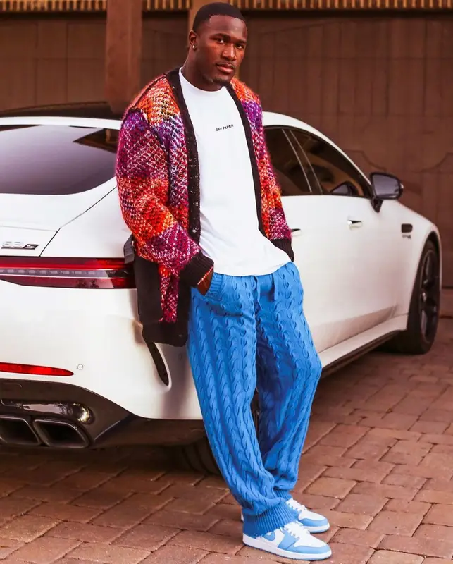Devin White outfit in Saint Laurent, Nike, and Daily Paper, 2021