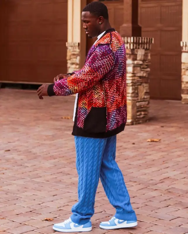 Devin White outfit in Saint Laurent, Nike, and Daily Paper, 2021
