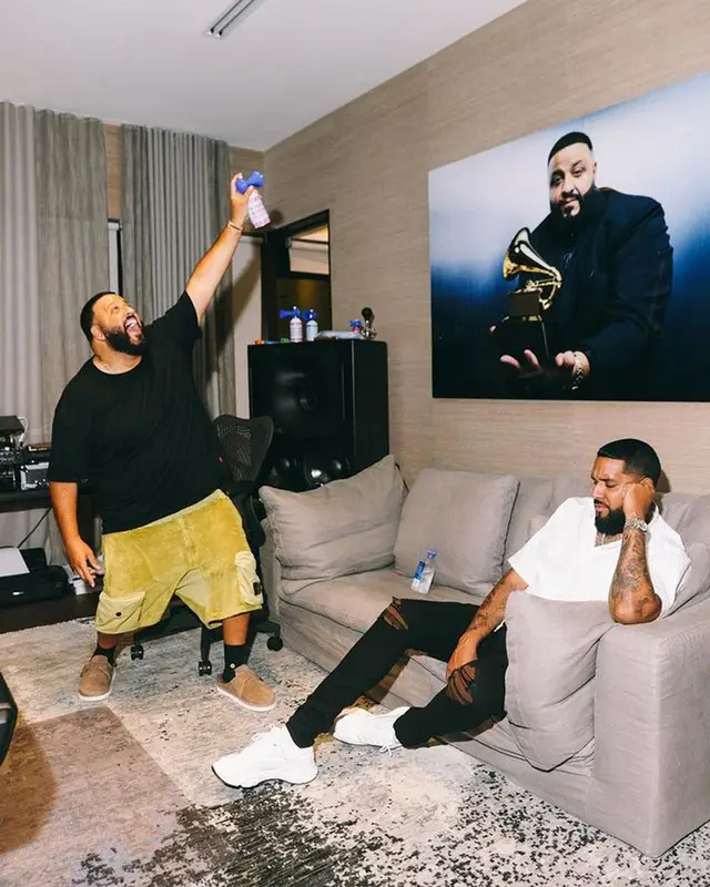 DJ Khaled outfit in Polo Ralph Lauren, Stone Island, and Louis Vuitton, 2021
