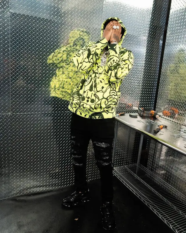 Fivio Foreign outfit in Givenchy, Amiri, and Prada, 2021