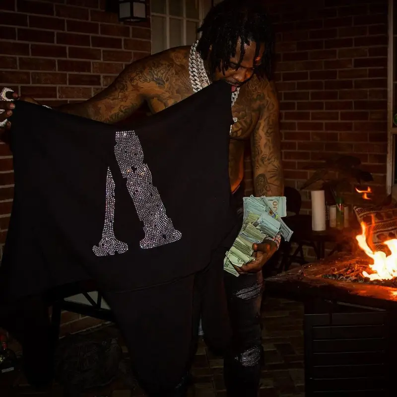 EST Gee outfit in Vlone, Amiri, and Giuseppe Zanotti, 2021