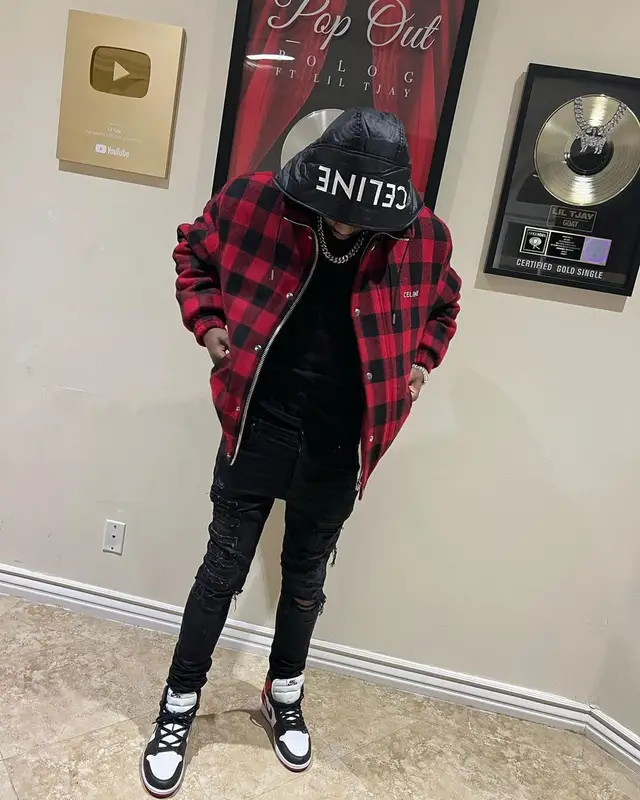 Lil Tjay outfit in Celine, Chrome Hearts, and Amiri, 2022