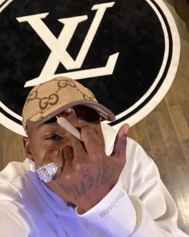 DaBaby outfit in Dolce & Gabbana and Gucci, 2022