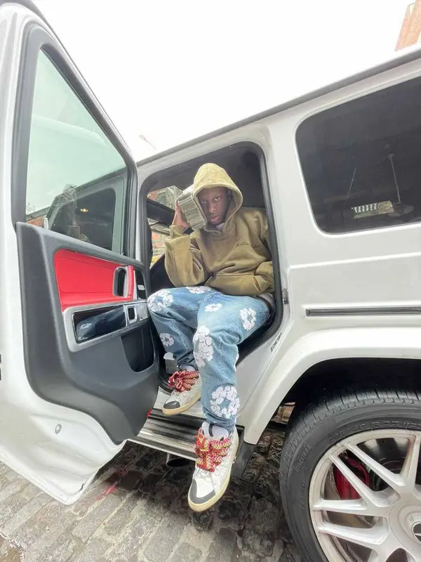 Bloody Osiris outfit in Levi’s, Lanvin, and Denim Tears, 2022