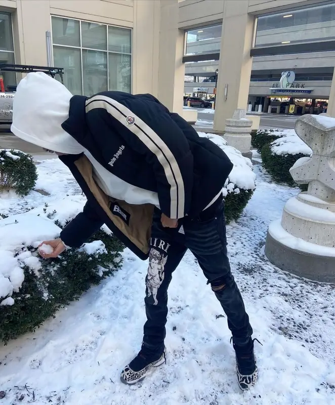 Lil Poppa outfit in Palm Angels, Amiri, and Moncler, 2022