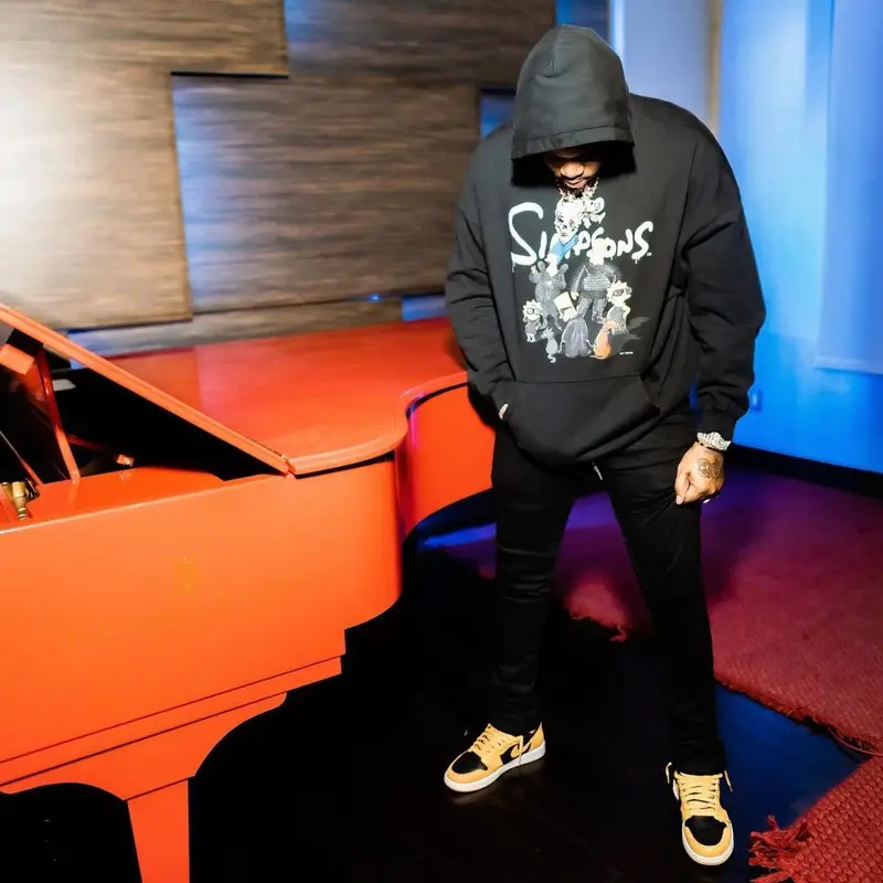Fivio Foreign outfit in Balenciaga, Nike, and Cartier, 2022