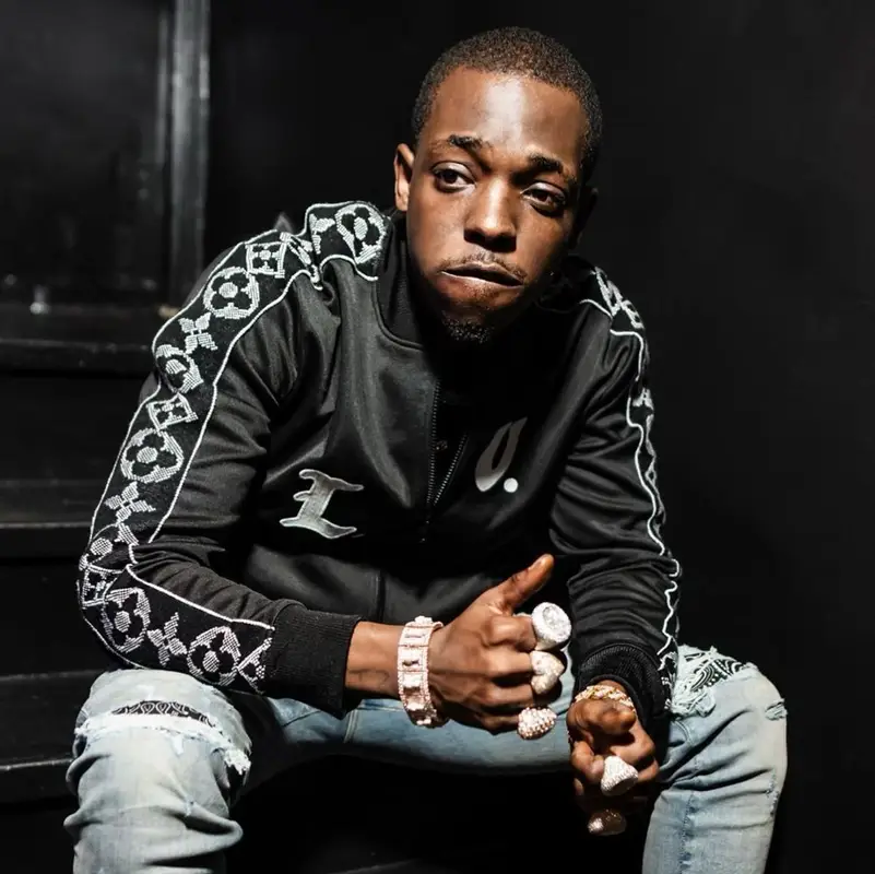 Bobby Shmurda outfit in Louis Vuitton and Amiri, 2022
