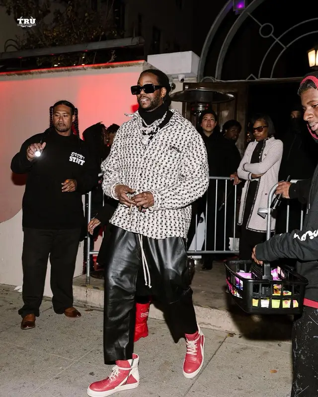 2 Chainz outfit in Prada, Louis Vuitton, and Cout De La Liberte, 2022
