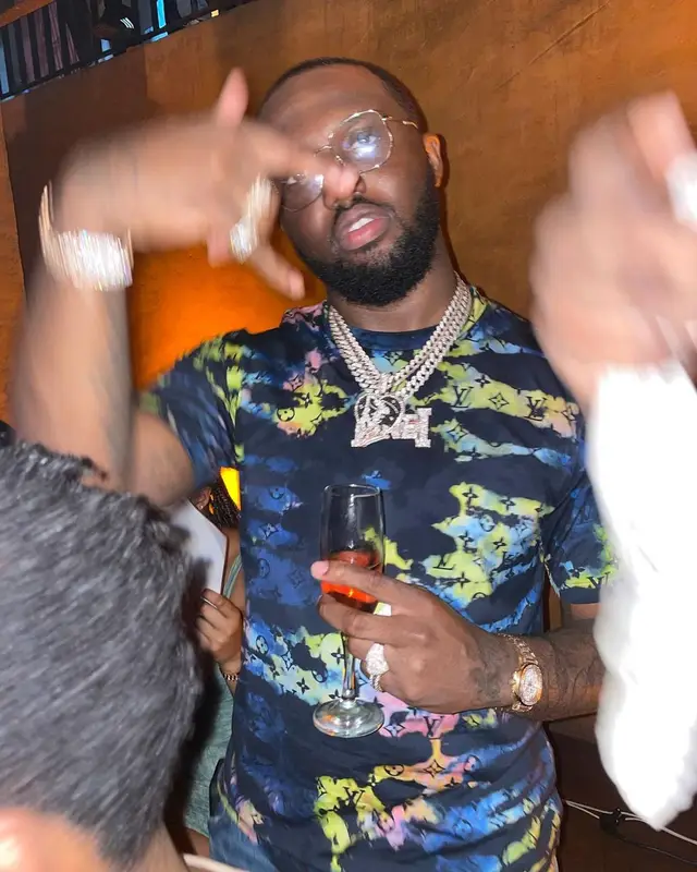 Headie One outfit in Louis Vuitton and Amiri, 2022