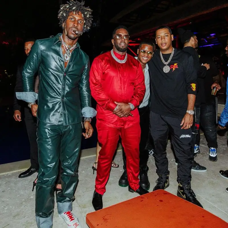 Saint JHN outfit in Bottega Veneta, Chanel, and Pharrell Williams, 2022