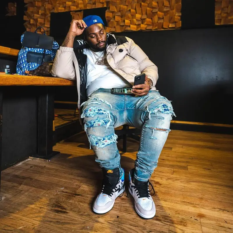 Peezy outfit in Moncler, Amiri, and Nike, 2022