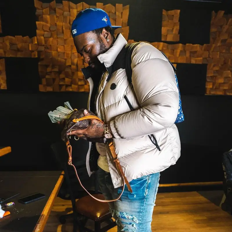 Peezy outfit in Moncler, Amiri, and Nike, 2022