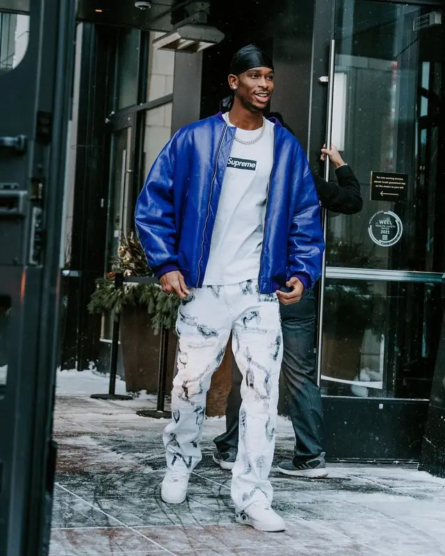 Shai outfit in Prada, Supreme, and Vlone, 2022