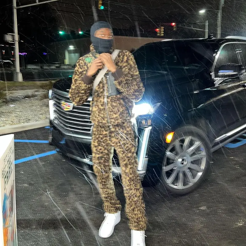 Meek Mill outfit in Amiri and Nike, 2022