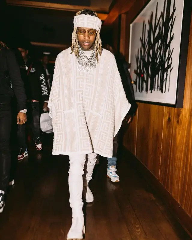 Lil Durk outfit in Balmain, Amiri, and Raf Simons, 2022