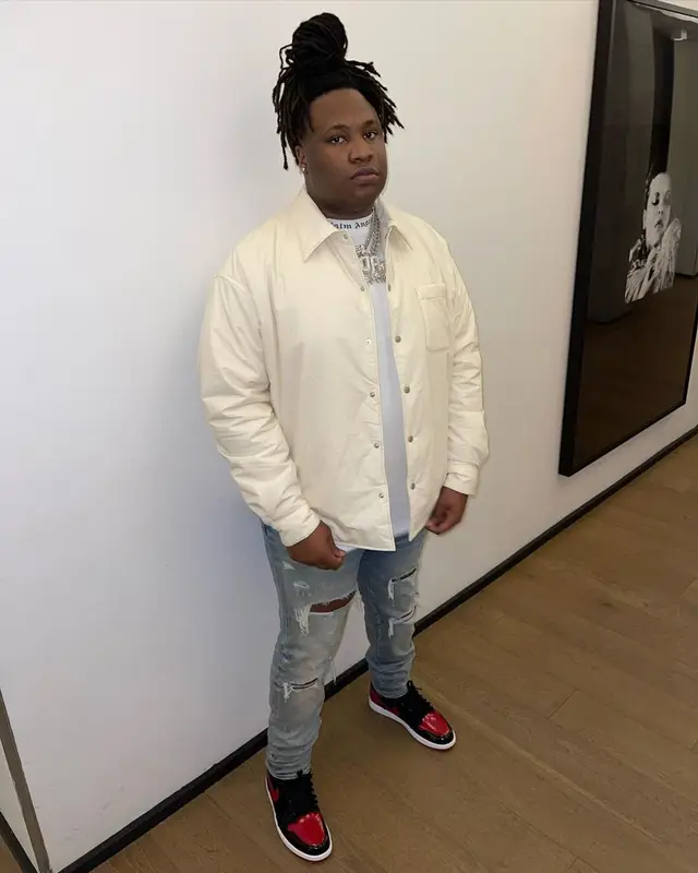 Tay Keith outfit in Palm Angels, Amiri, and Nike, 2022