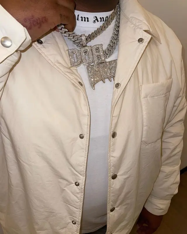 Tay Keith outfit in Palm Angels, Amiri, and Nike, 2022