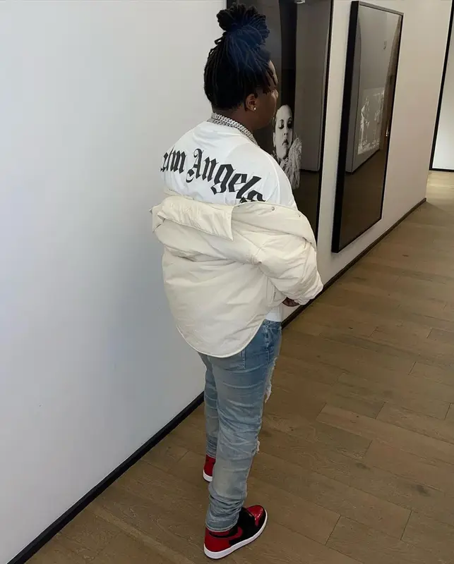 Tay Keith outfit in Palm Angels, Amiri, and Nike, 2022