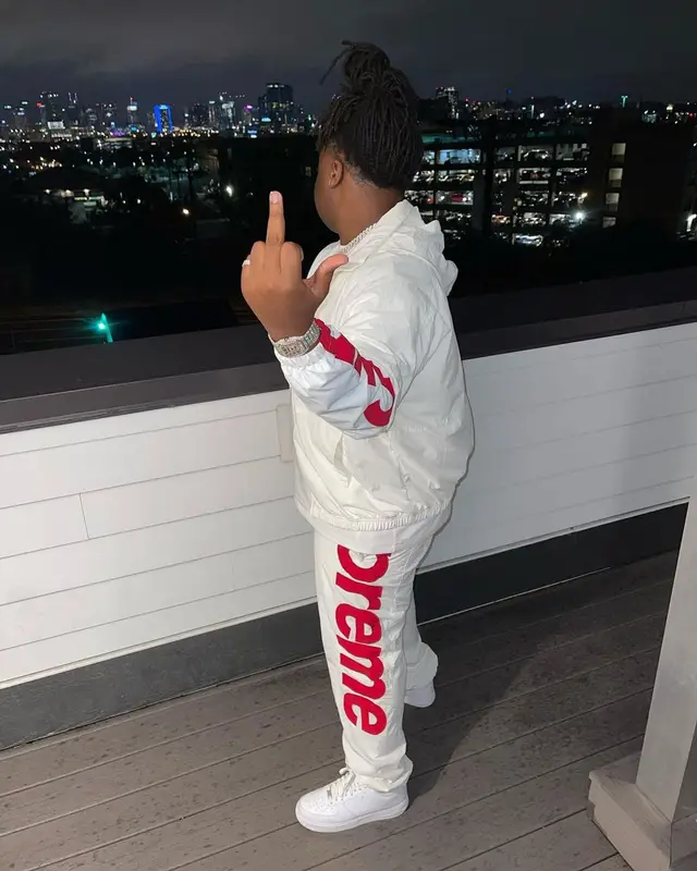 Tay Keith outfit in Supreme and Nike, 2021