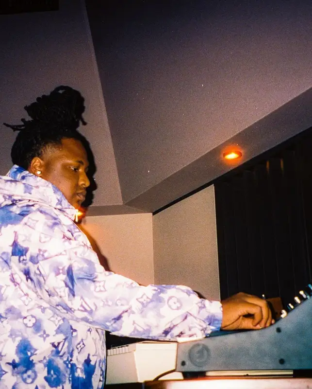 Tay Keith outfit in Louis Vuitton and Stone Island, 2021