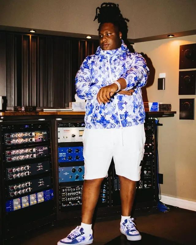 Tay Keith outfit in Louis Vuitton and Stone Island, 2021