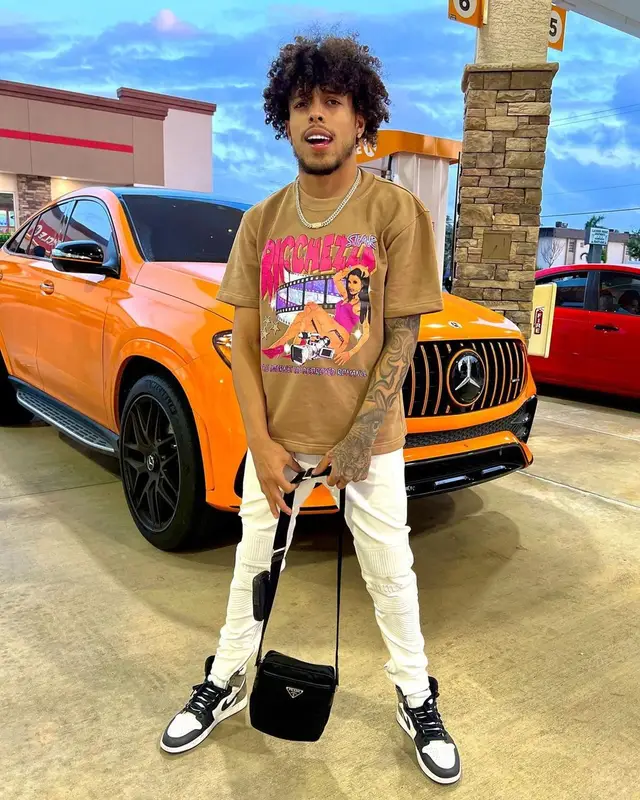 King Cid outfit in Ricchezza Forever, Nike, and Prada, 2022