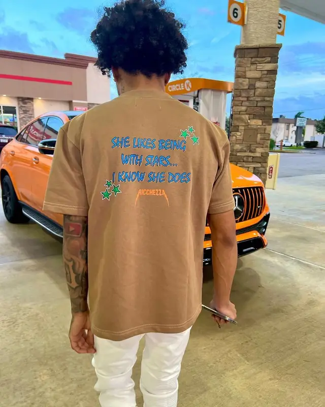 King Cid outfit in Ricchezza Forever, Nike, and Prada, 2022