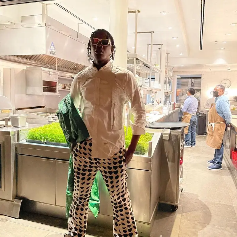 Bloody Dior outfit in Thom Browne, Marni, and Louis Vuitton, 2022