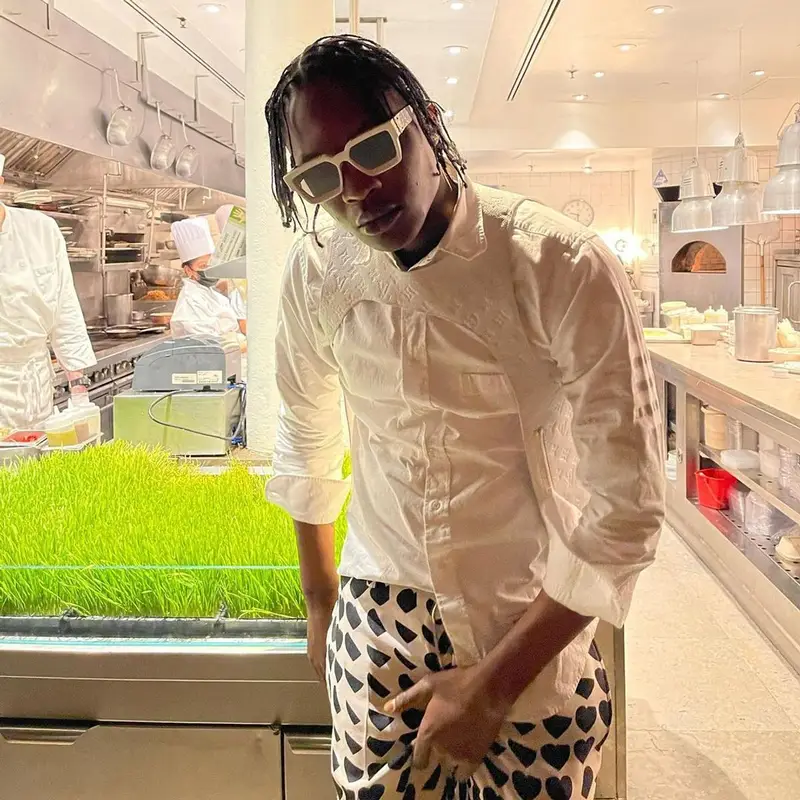 Bloody Dior outfit in Thom Browne, Marni, and Louis Vuitton, 2022