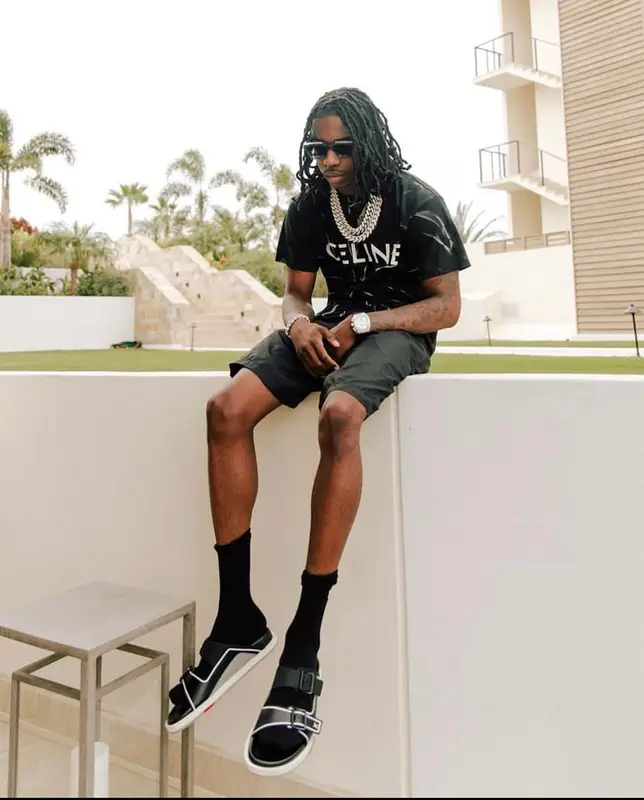 Polo G outfit in Celine and Louis Vuitton, 2022