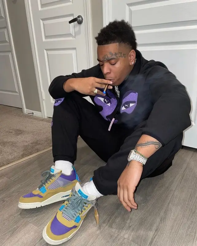 Lil Gotit outfit in Puma, Jordan, and KidSuper, 2022