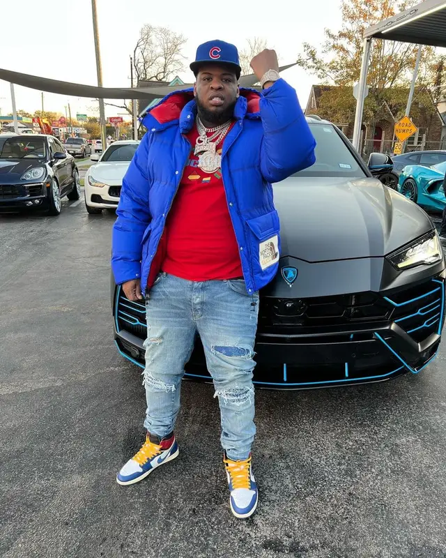 Maxo Kream outfit in Gucci, New Era, and The North Face, 2022