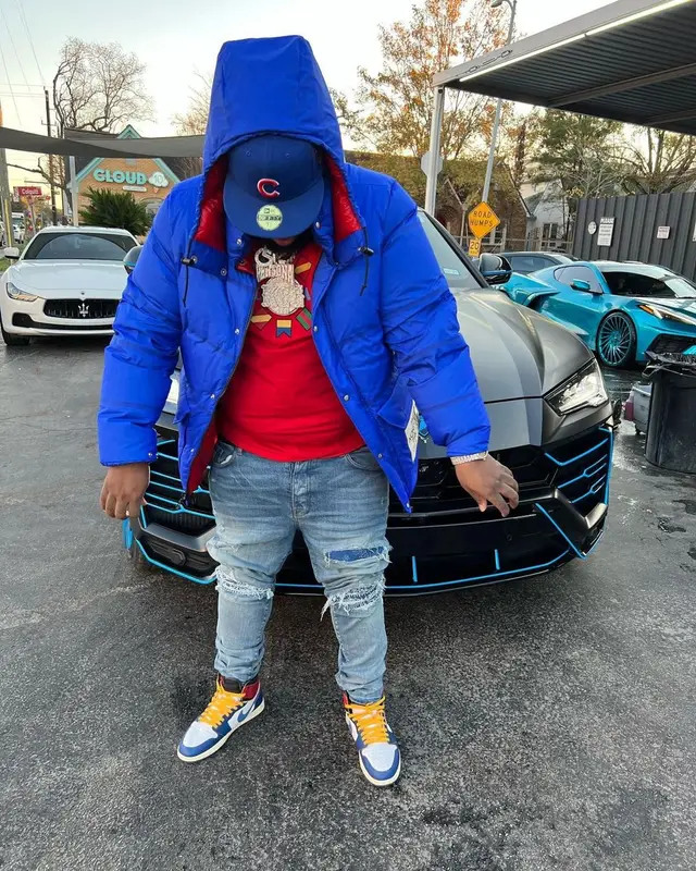 Maxo Kream outfit in Gucci, New Era, and The North Face, 2022