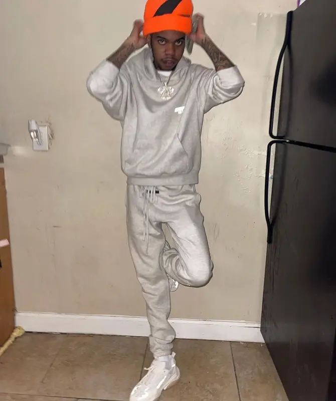 Lil Poppa outfit in Fear of God and Amiri, 2022