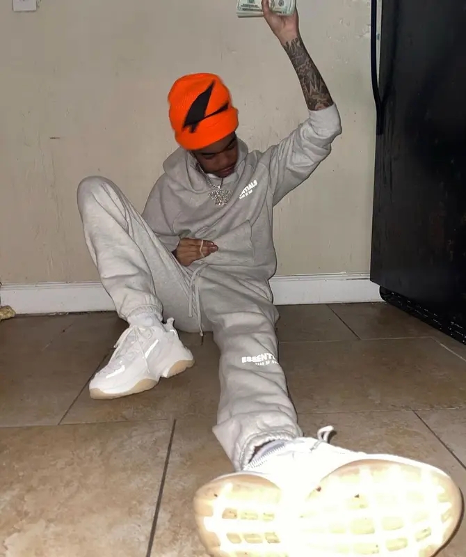 Lil Poppa outfit in Fear of God and Amiri, 2022