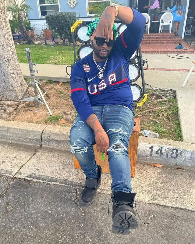 Peezy outfit in Nike, Amiri, and Louis Vuitton, 2022