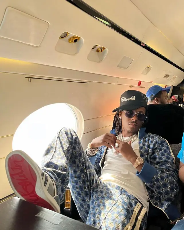 Rich The Kid outfit in Wales Bonner, Christian Louboutin, and Goyard, 2022