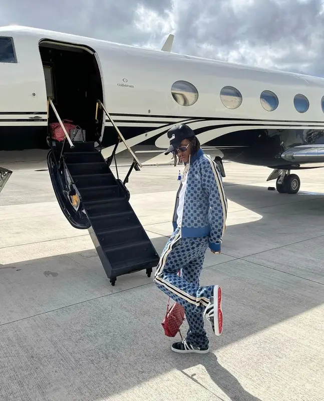 Rich The Kid outfit in Wales Bonner, Christian Louboutin, and Goyard, 2022