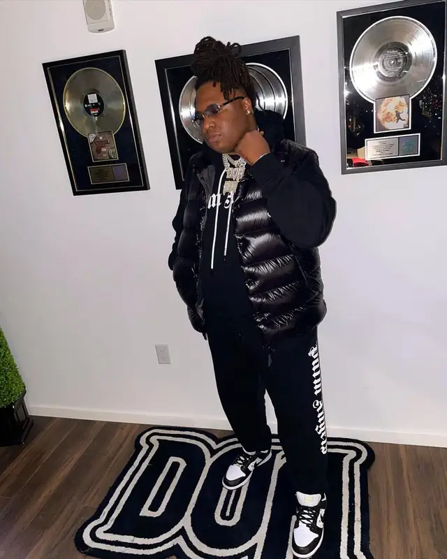 Tay Keith outfit in Moncler, Palm Angels, and Cartier, 2022