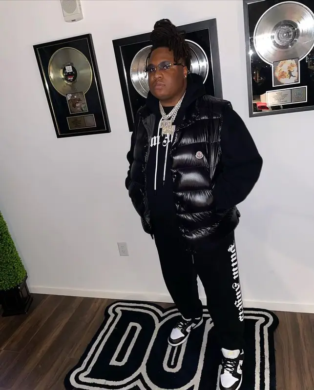 Tay Keith outfit in Moncler, Palm Angels, and Cartier, 2022