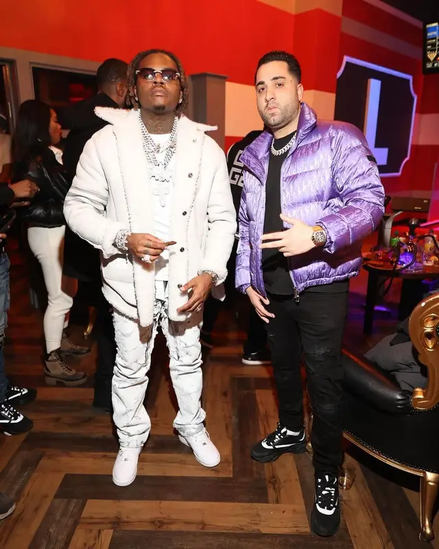 Gunna outfit in Thom Browne, Givenchy, and Nike, 2022