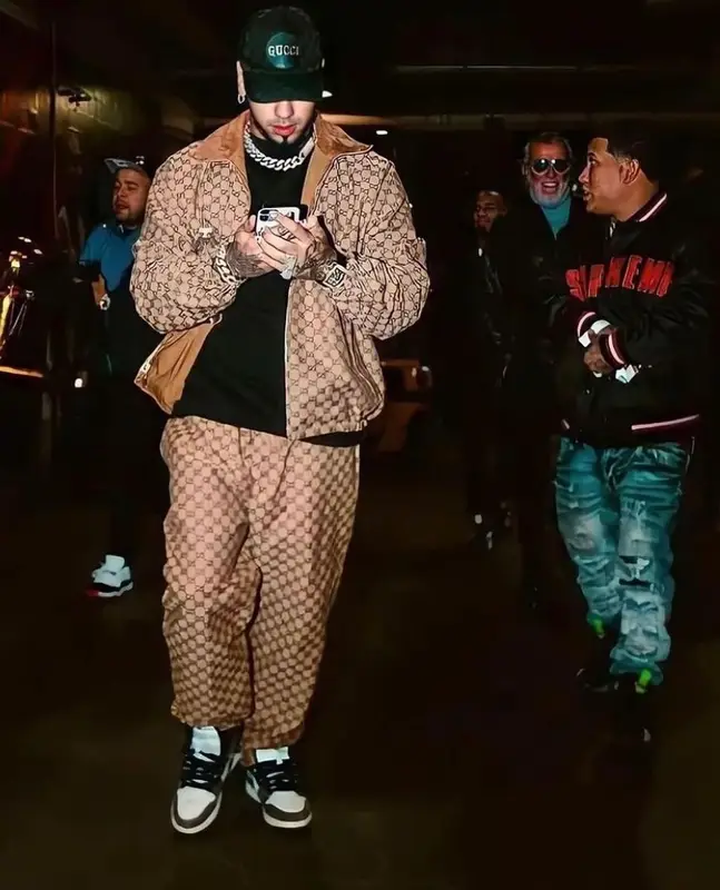 Anuel AA outfit in Nike, Gucci, and Travis Scott Merch, 2022