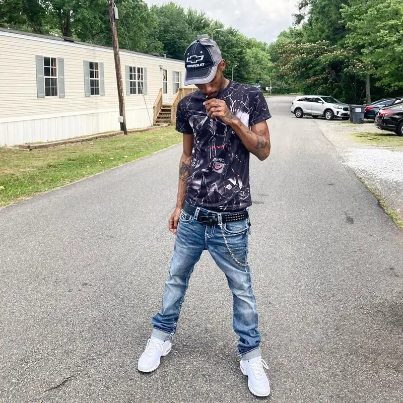 Black Kray outfit in True Religion, Nike, and Chevrolet, 2021